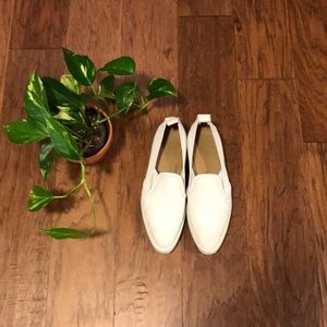Amazing white soft leather shoes by Everlane.